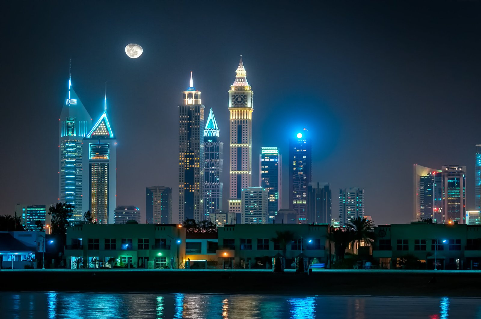Amazing night panorama reflection of Jumeirah Beach skycrapers, Dubai, United Arab Emirates